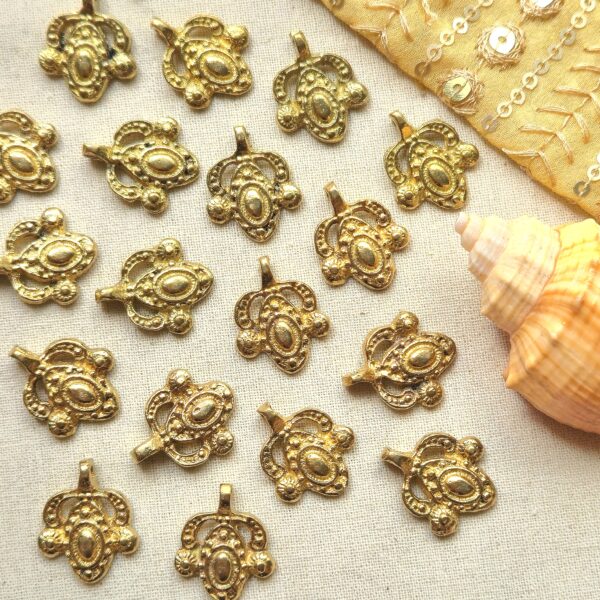 Ornate Oval Brass Charms